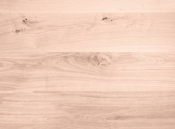 brown wooden surface with white and black textile