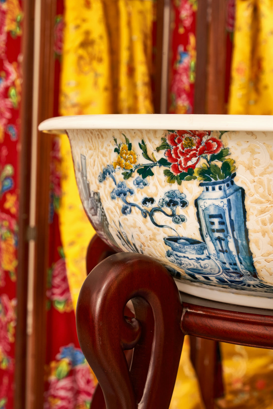 A large bowl sitting on top of a wooden stand