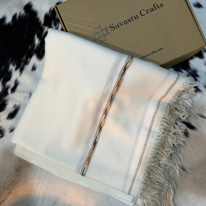 Elevate your style with the Swati 72 Wool Shawl, crafted from 100% pure wool for unbeatable warmth and comfort. Weighing 370 grams, this shawl is both lightweight and luxurious, offering an ideal balance of softness and durability. Designed for men who appreciate quality and elegance, its timeless style seamlessly complements any wardrobe, whether for everyday wear or special occasions. The natural wool fabric provides excellent insulation, keeping you warm in cooler weather, while its breathable nature ens